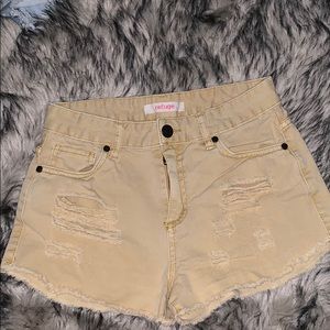 Refuge Khaki tan cream distressed jean shorts.